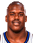 Shaquille O'Neal in a white Magic jersey